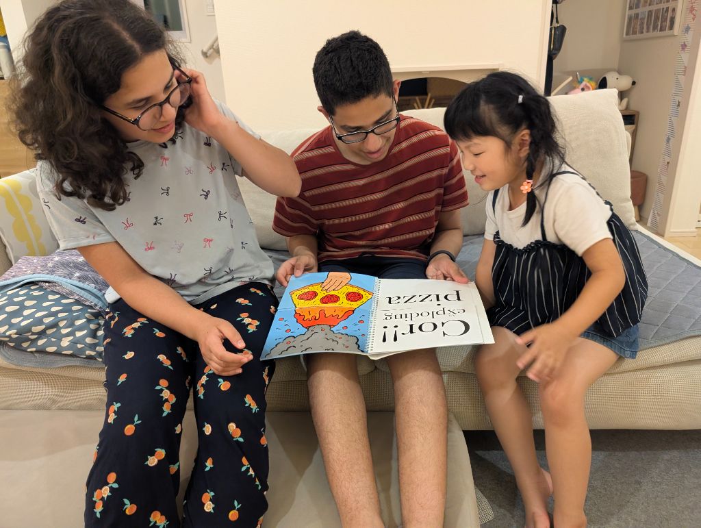 Students reading together in homestay
